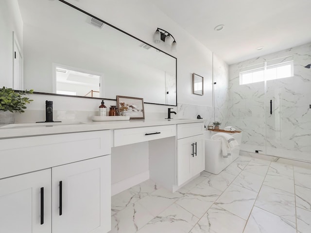 7812 Colonial Ln, Houston, TX 77051 - bathroom with a marble finish shower, marble look tiles, and double vanity