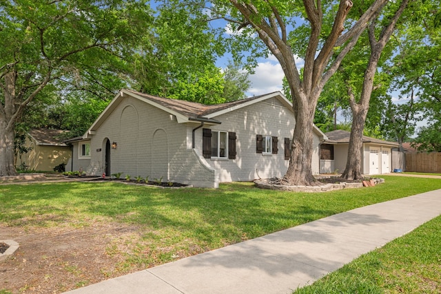 12302 Rincon Dr, Houston, TX 77077 - view of front of property featuring a garage, brick siding, and concrete driveway