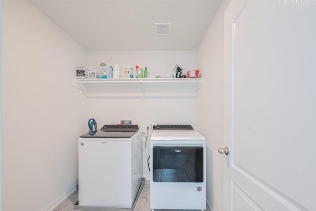 6831 Beck Canyon Dr, Houston, TX 77084 - laundry room featuring washing machine and clothes dryer and baseboards