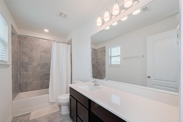 6831 Beck Canyon Dr, Houston, TX 77084 - bathroom with vanity, toilet, shower / bath combination with curtain, and tile patterned floors