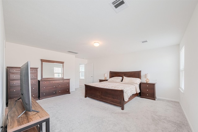 6831 Beck Canyon Dr, Houston, TX 77084 - carpeted bedroom with multiple windows and baseboards