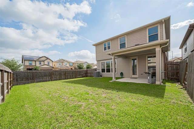 6831 Beck Canyon Dr, Houston, TX 77084 - back of house with a patio, central air condition unit, and a residential view