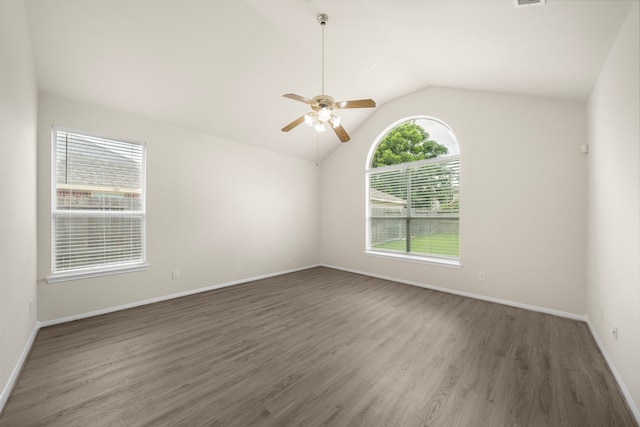 18231 Emerald Stone Ln, Houston, TX 77094 - spare room with a ceiling fan, wood finished floors, vaulted ceiling, and baseboards