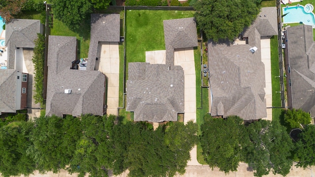 18231 Emerald Stone Ln, Houston, TX 77094 - aerial overview of property's location with a pool area and nearby suburban area