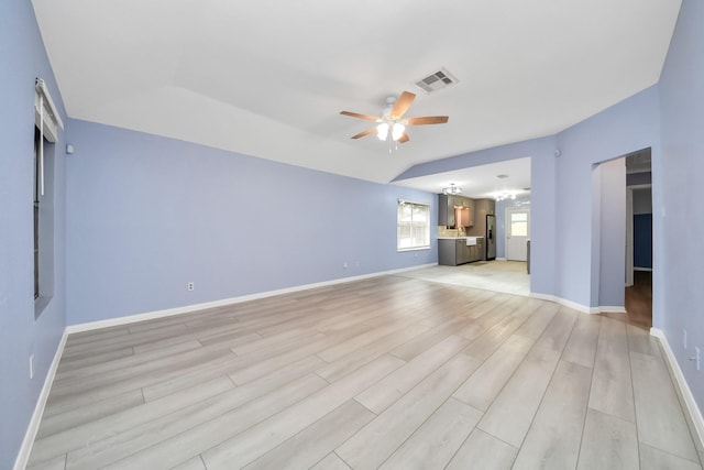 2323 Chalet Rd, Houston, TX 77038 - unfurnished living room featuring ceiling fan, light wood finished floors, and baseboards