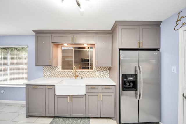 2323 Chalet Rd, Houston, TX 77038 - kitchen with stainless steel fridge, gray cabinets, and a sink