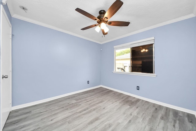 2323 Chalet Rd, Houston, TX 77038 - unfurnished room featuring wood finished floors, baseboards, a ceiling fan, and crown molding