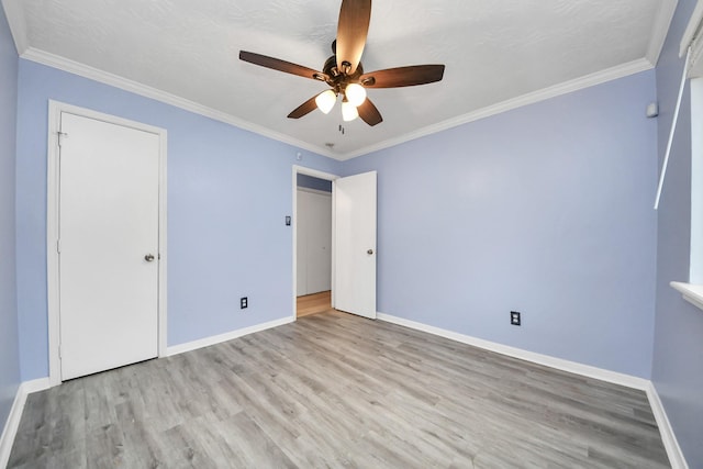 2323 Chalet Rd, Houston, TX 77038 - unfurnished bedroom featuring wood finished floors, baseboards, and crown molding