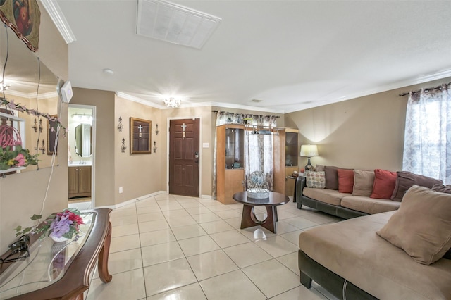living area featuring light tile patterned floors, ornamental molding, and baseboards