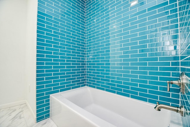 1307 Remington Crest Dr, Houston, TX 77094 - full bathroom featuring marble finish flooring, baseboards, and shower / bathtub combination