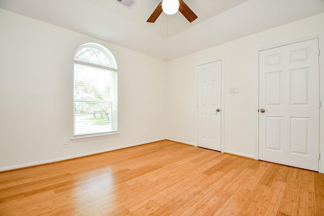1307 Remington Crest Dr, Houston, TX 77094 - unfurnished bedroom featuring light wood-type flooring, baseboards, and ceiling fan