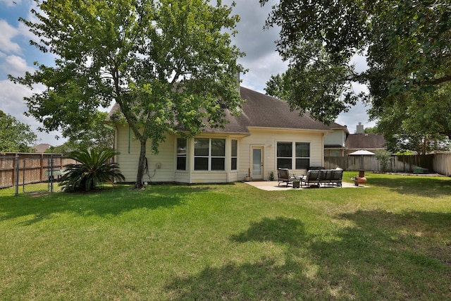 12002 Iris Canyon Dr, Tomball, TX 77377 - back of house featuring a patio area and an outdoor living space