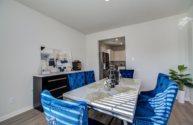 3121 Freeboard Dr, Texas City, TX 77510 - dining room featuring light wood-style floors and baseboards