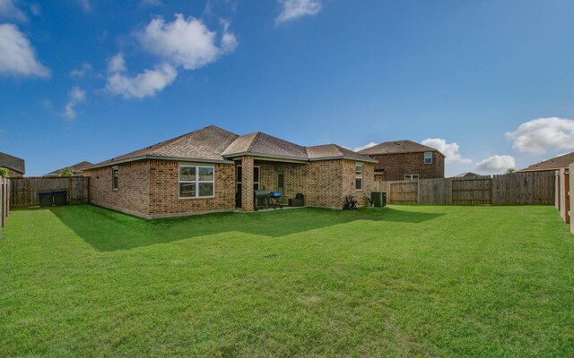 3121 Freeboard Dr, Texas City, TX 77510 - rear view of property featuring brick siding and a shingled roof