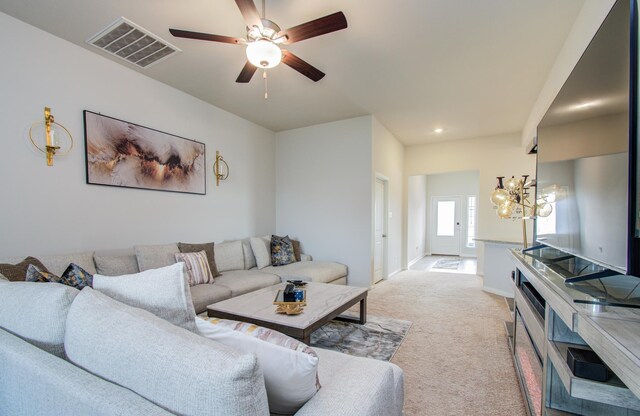 3121 Freeboard Dr, Texas City, TX 77510 - living area featuring a chandelier, light carpet, a ceiling fan, and recessed lighting