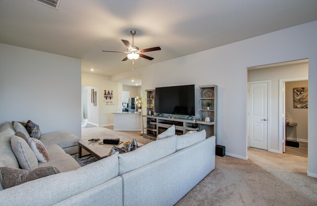 3121 Freeboard Dr, Texas City, TX 77510 - living room featuring ceiling fan, light colored carpet, and baseboards