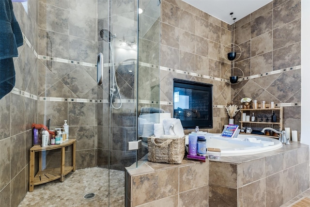 1652 Norfolk St Unit A, Houston, TX 77006 - bathroom with a shower stall, a bath, and tile walls