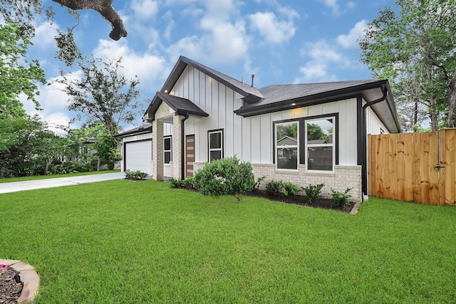 5731 Belvedere St, Houston, TX 77021 - modern farmhouse featuring board and batten siding, a garage, concrete driveway, and brick siding