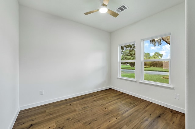 5731 Belvedere St, Houston, TX 77021 - unfurnished room with baseboards, a ceiling fan, and dark wood-style floors