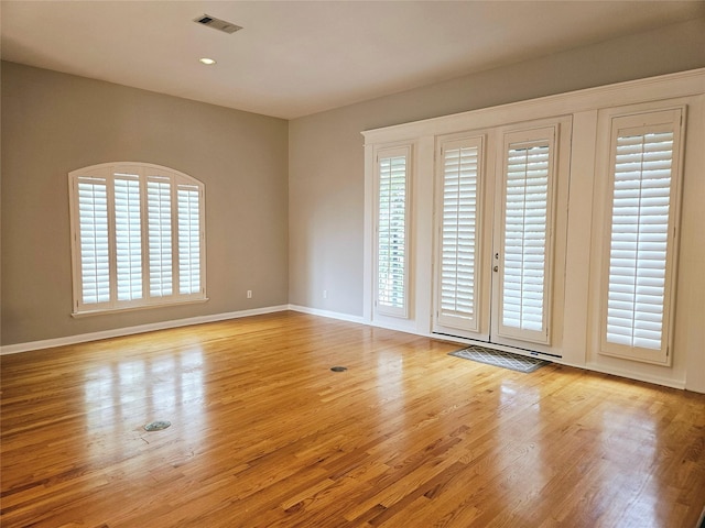 3818 Hazard St, Houston, TX 77098 - unfurnished room with wood finished floors, baseboards, and recessed lighting
