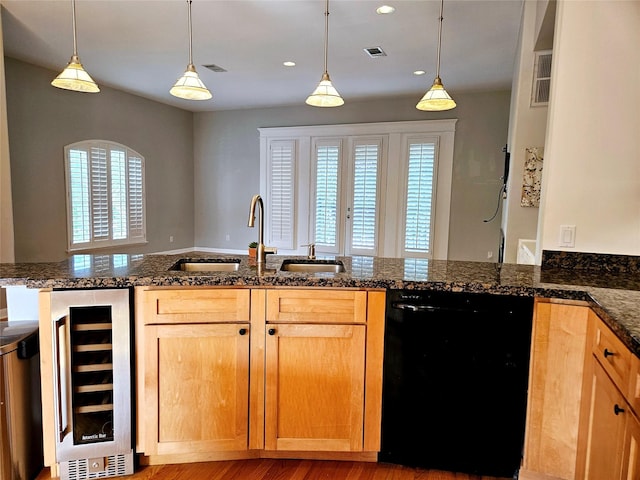 3818 Hazard St, Houston, TX 77098 - kitchen featuring black dishwasher, beverage cooler, a sink, recessed lighting, and hanging light fixtures