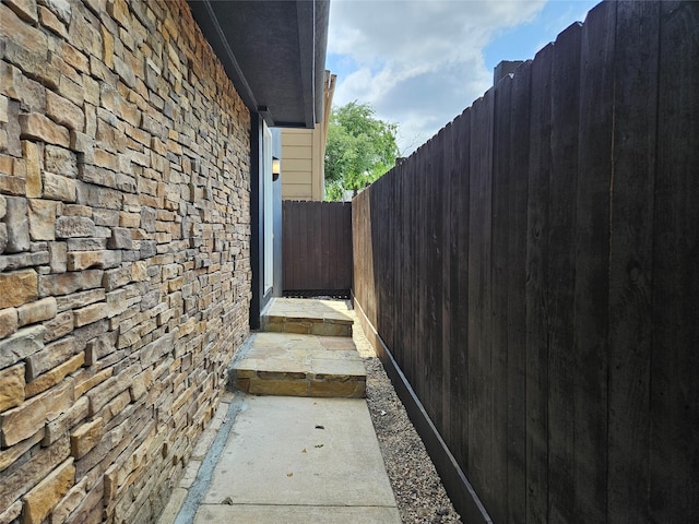 3818 Hazard St, Houston, TX 77098 - view of side of property with stone siding and fence
