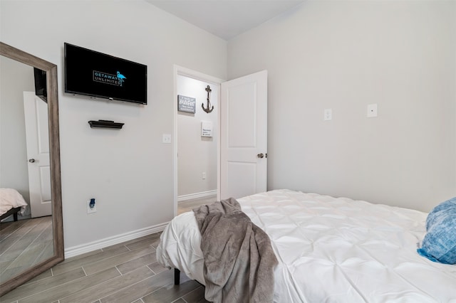 16858 W Alderson, Montgomery, TX 77316 - bedroom with wood tiled floors and baseboards