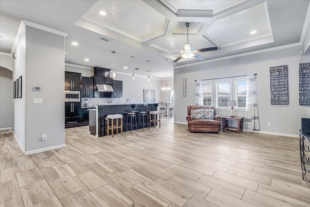 living room featuring ornamental molding, ceiling fan, recessed lighting, baseboards, and wood tiled floors