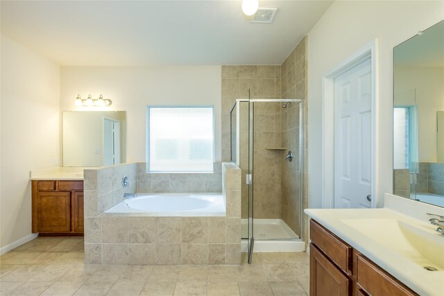 8919 Inglebrook Ln, Houston, TX 77083 - bathroom with a stall shower, a bath, and two vanities