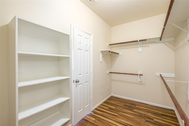 8919 Inglebrook Ln, Houston, TX 77083 - walk in closet featuring wood finished floors