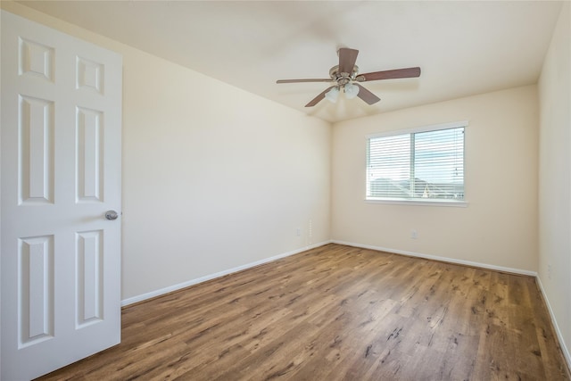 8919 Inglebrook Ln, Houston, TX 77083 - empty room featuring baseboards, wood finished floors, and a ceiling fan