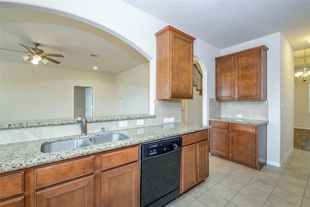 8919 Inglebrook Ln, Houston, TX 77083 - kitchen featuring dishwasher, a sink, backsplash, and light stone countertops