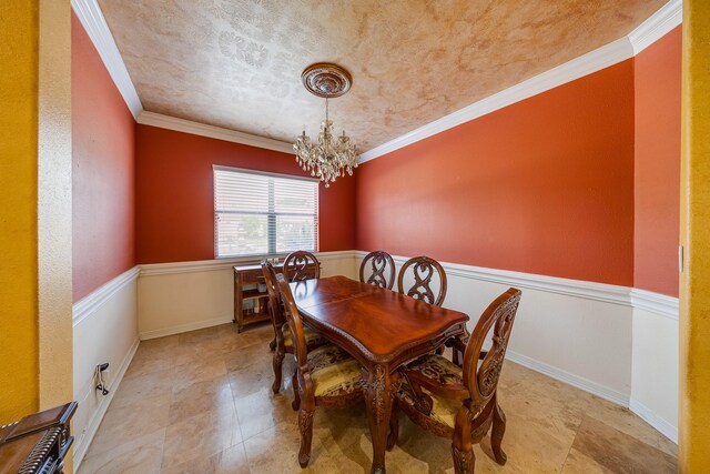 8606 Argentina St, Jersey Village, TX 77040 - dining space featuring a chandelier, ornamental molding, and baseboards