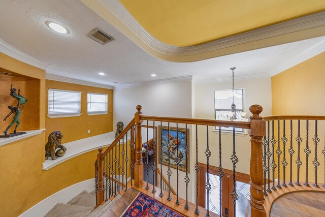 8606 Argentina St, Jersey Village, TX 77040 - stairs with ornamental molding, wood finished floors, and recessed lighting