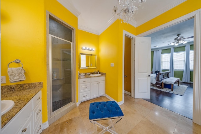 8606 Argentina St, Jersey Village, TX 77040 - full bath featuring crown molding, a shower stall, two vanities, a chandelier, and tile patterned floors