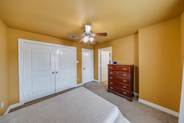 8606 Argentina St, Jersey Village, TX 77040 - carpeted bedroom featuring a closet, baseboards, and ceiling fan