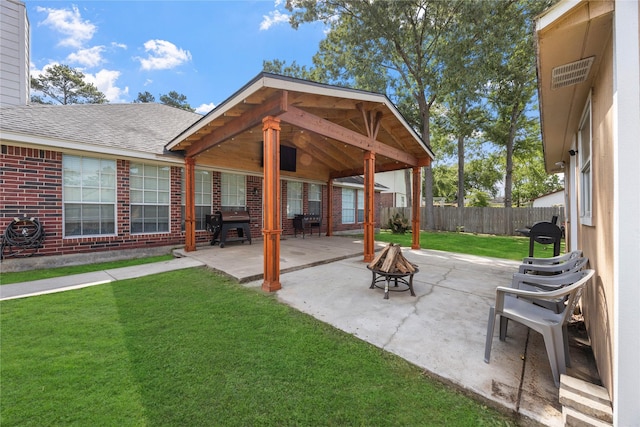 15703 W Astern Dr, Crosby, TX 77532 - view of patio / terrace with a fire pit