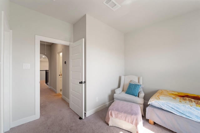 7010 Grassland Vista Ln, Katy, TX 77493 - bedroom with light colored carpet and arched walkways