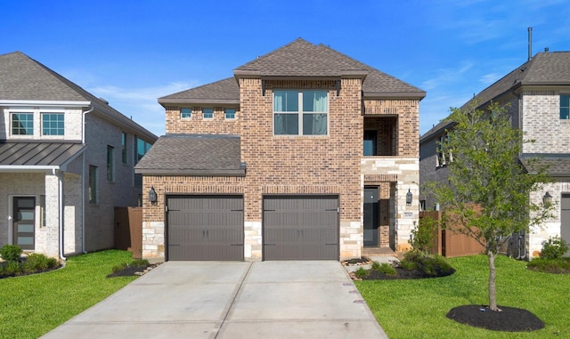 7010 Grassland Vista Ln, Katy, TX 77493 - view of front of property with a shingled roof, a garage, driveway, brick siding, and stone siding