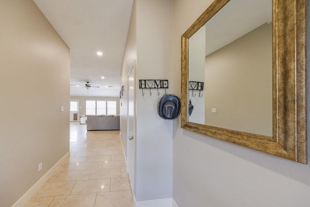 3610 Banks Run Ln, Katy, TX 77449 - hallway featuring recessed lighting, light tile patterned flooring, and baseboards