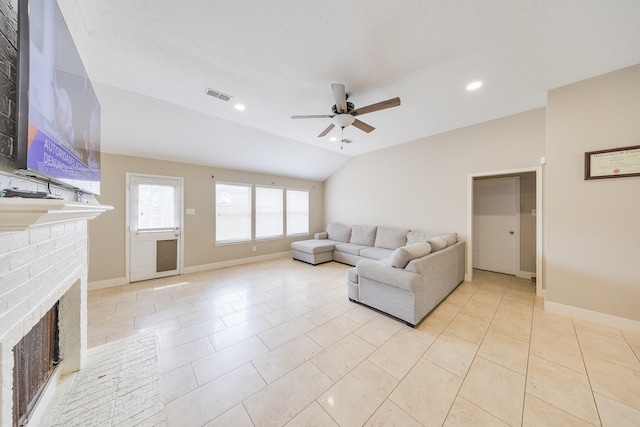 3610 Banks Run Ln, Katy, TX 77449 - living area with a brick fireplace, a ceiling fan, vaulted ceiling, recessed lighting, and baseboards