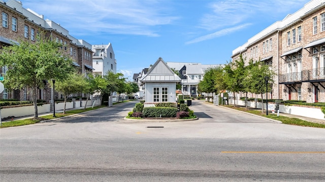 2616 Lake Kolbe Ln, Houston, TX 77080 - view of asphalt street featuring a residential view, curbs, street lighting, and sidewalks