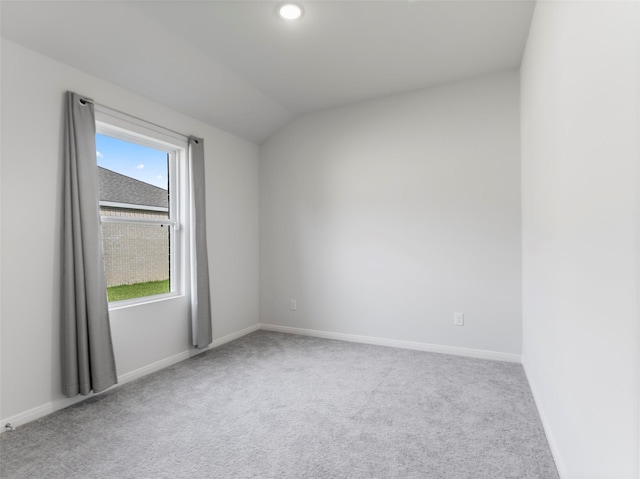 2715 Marguerite St, Bay City, TX 77414 - carpeted empty room with baseboards and lofted ceiling