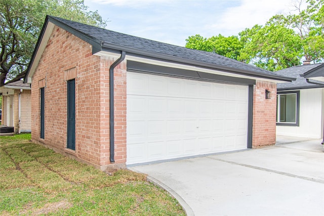 2402 N Ferrisburg Ct, Sugar Land, TX 77478 - garage featuring driveway