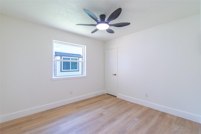 2402 N Ferrisburg Ct, Sugar Land, TX 77478 - unfurnished room featuring light wood-style floors, baseboards, and ceiling fan