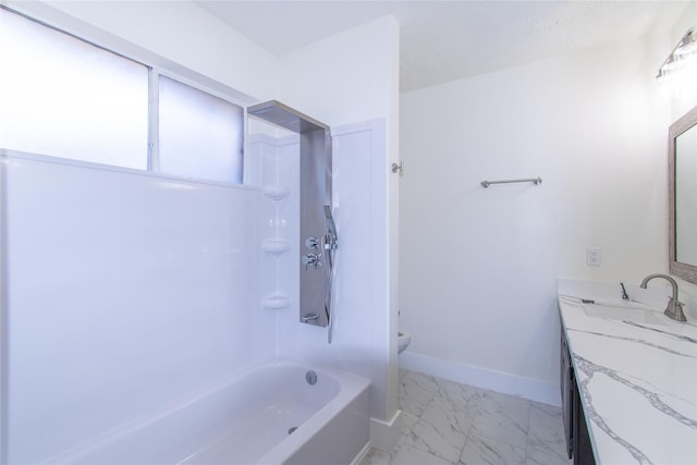 2402 N Ferrisburg Ct, Sugar Land, TX 77478 - bathroom with marble look tiles, toilet, baseboards, vanity, and shower / washtub combination