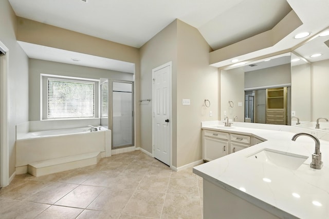 24806 Silver Leaf St, Magnolia, TX 77355 - bathroom with a shower stall, a garden tub, double vanity, a closet, and recessed lighting