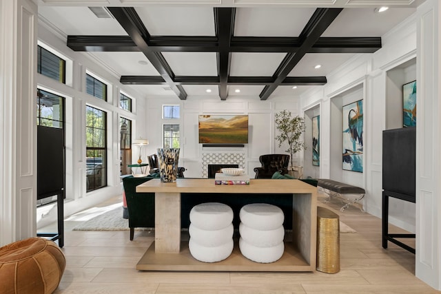 3702 Deerbend Ct, Spring, TX 77386 - home office with coffered ceiling, beamed ceiling, light wood-style floors, a decorative wall, and ornamental molding
