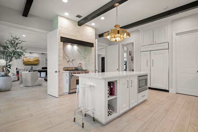 3702 Deerbend Ct, Spring, TX 77386 - kitchen with appliances with stainless steel finishes, beamed ceiling, open shelves, decorative backsplash, and a chandelier