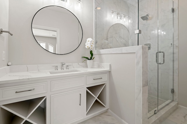 3702 Deerbend Ct, Spring, TX 77386 - bathroom featuring marble finish flooring, a stall shower, vanity, and baseboards